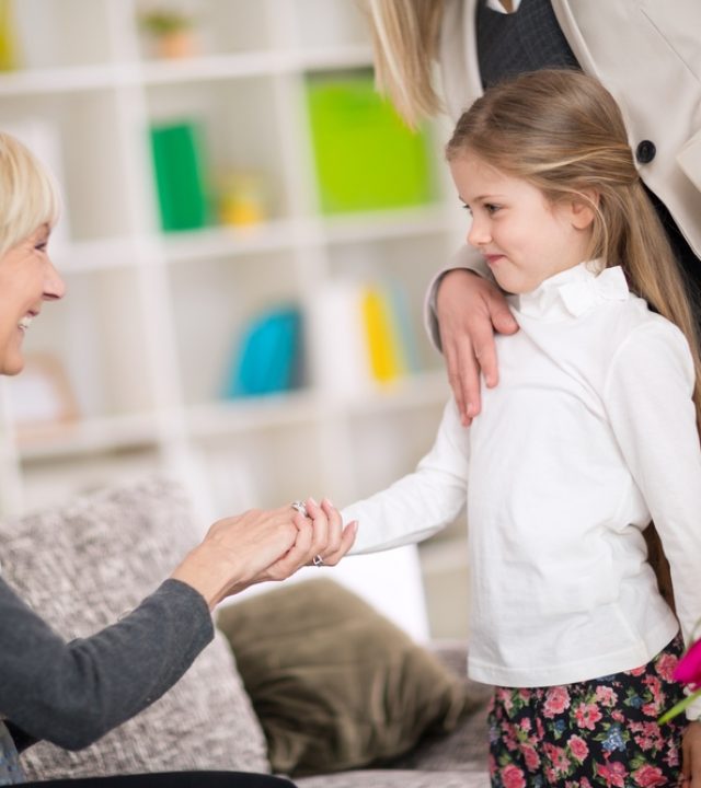 Little girl introduction her new babysitter